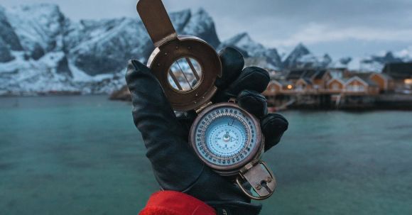 Adventure - Person Wearing Black Leather Gloves Holding Brass-colored Compass