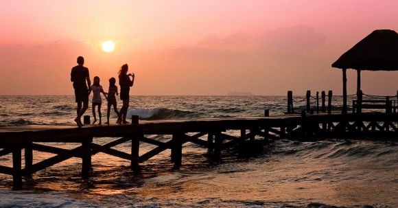 Family Travel - People Standing on Dock during Sunrise
