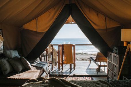 Accommodations - Cozy tent with bed and terrace on beach