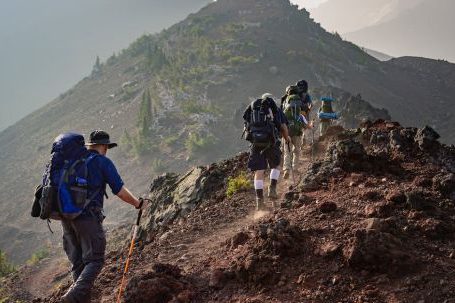 Mountaineering - Group of Person Walking in Mountain