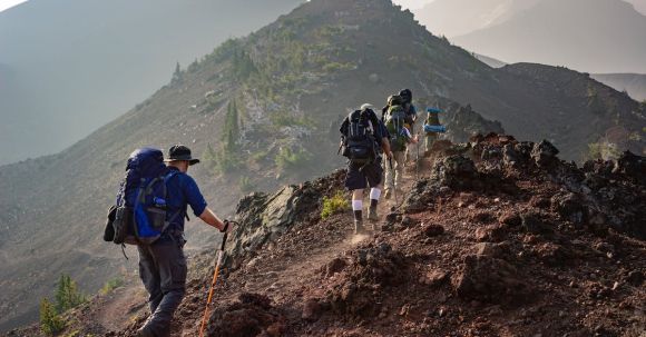 Mountaineering - Group of Person Walking in Mountain