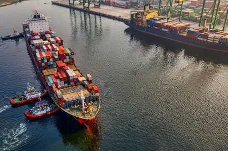 Port Travel - Aerial Shot of Cargo Ship on Sea