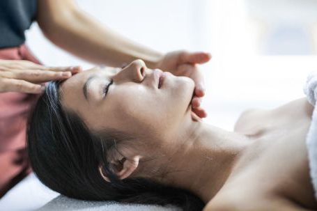 Spa - Selective Focus Photo of Woman Getting a Head Massage
