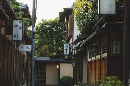 Local Fairs - Narrow alley with small traditional wooden houses in Japan