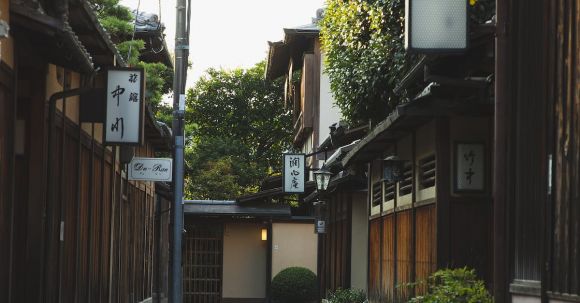 Local Fairs - Narrow alley with small traditional wooden houses in Japan
