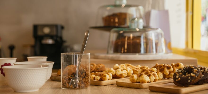 a-wooden-table-topped-with-lots-of-food